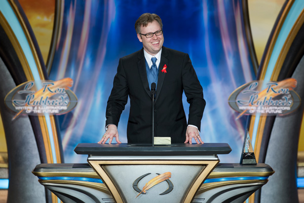 Auston Habershaw on stage accepting his award during the Annual Awards Ceremony