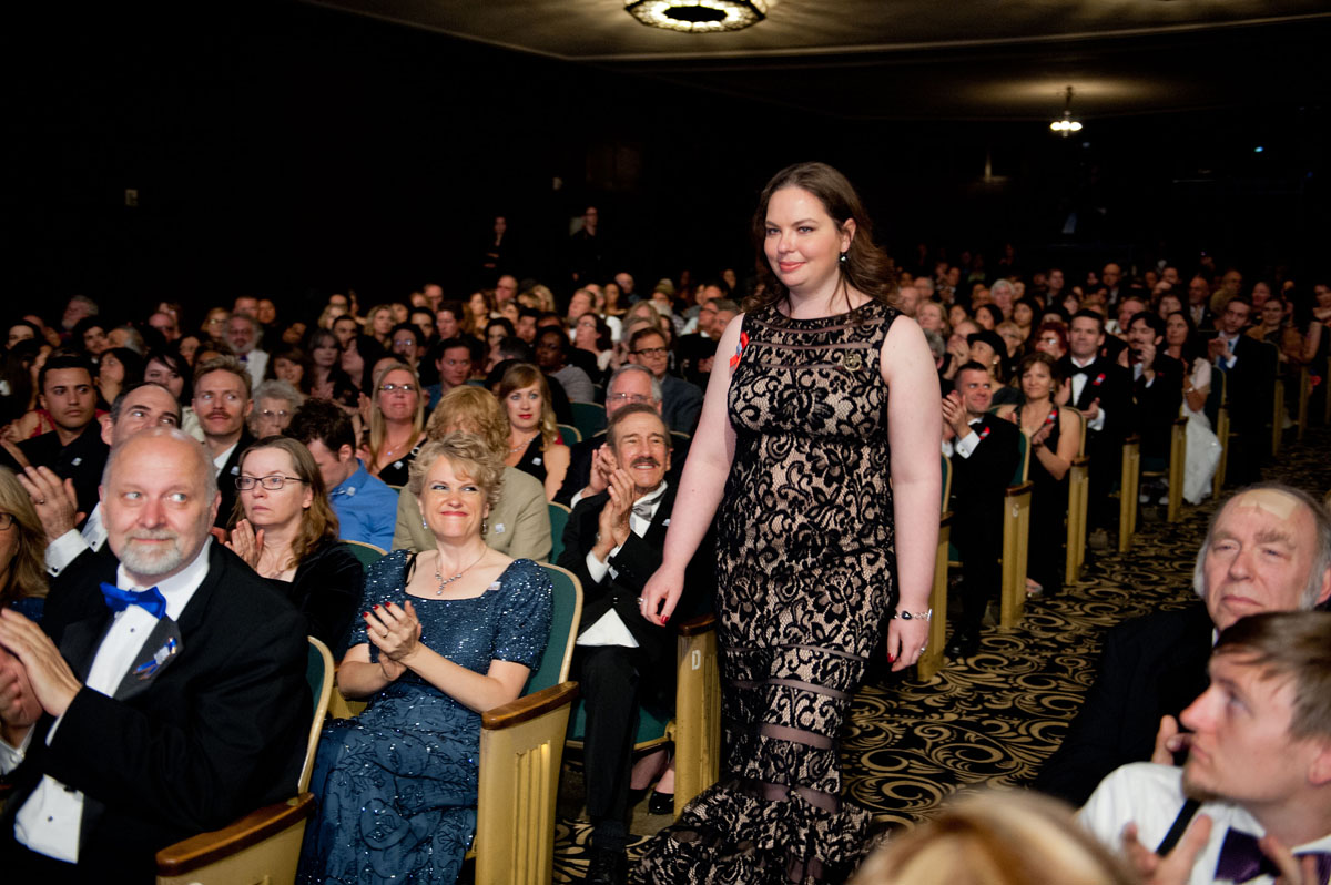 Anaea walking to the stage to receive her award