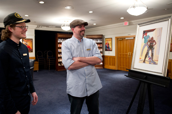 Alex Brock (left) with Daniel (right) admiring his artwork