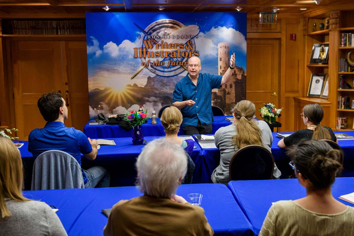 Robert J. Sawyer speaking to writer winners