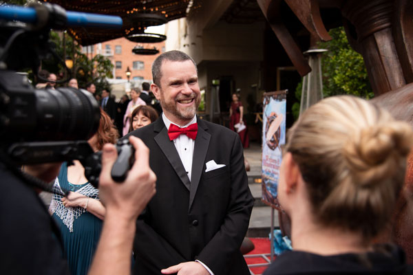 John Haas on red carpet at Writers of the Future gala