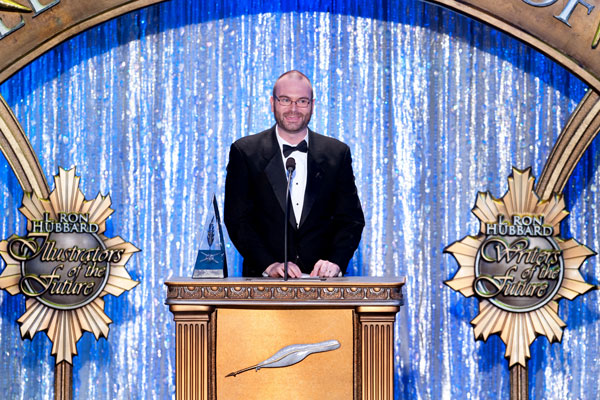 Jason Fischer at the 26th Annual Awards Ceremony accepting his award